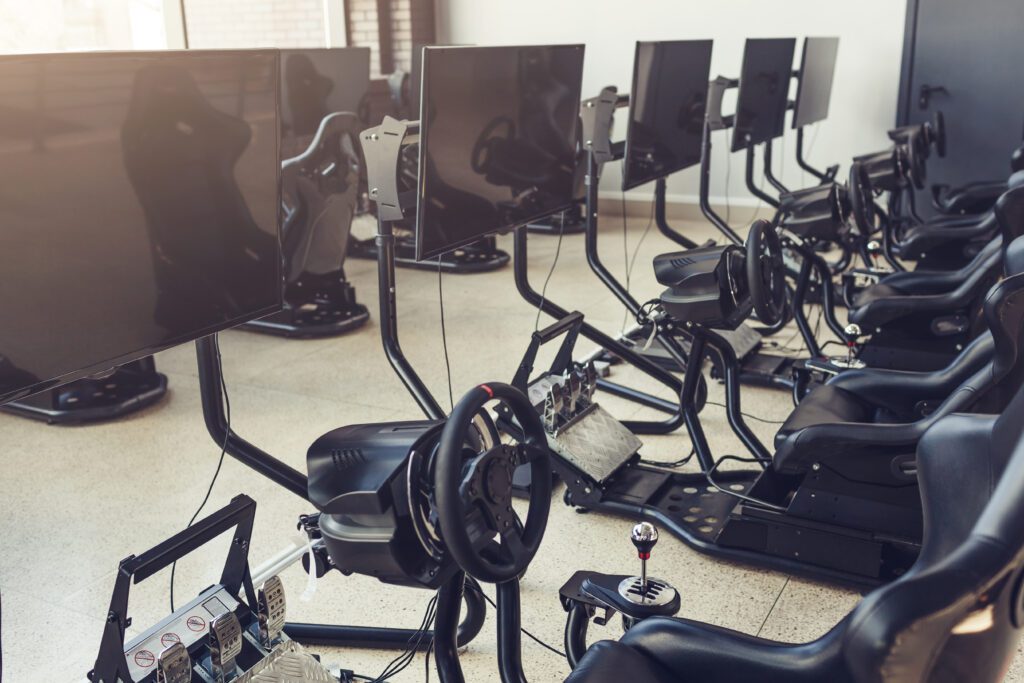 Row of driving simulator rigs